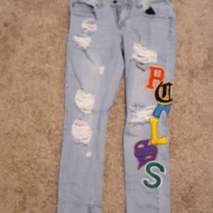 Young and reckless patched denim jeans